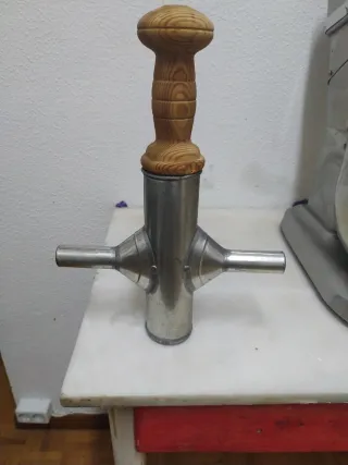 Churrera artesanal de metal y madera