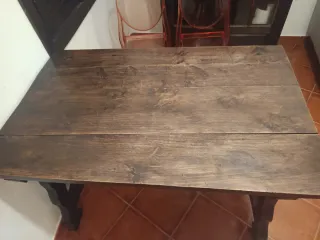 Mesa de comedor antigua de madera y metal