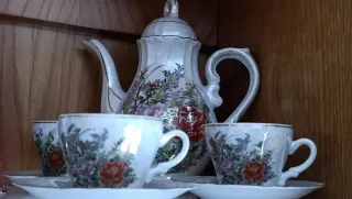 Juego de café de porcelana con música