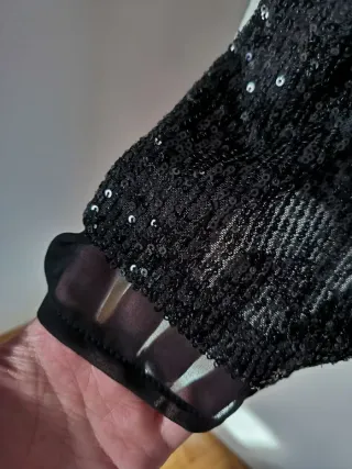 Top lentejuelas negro con tul