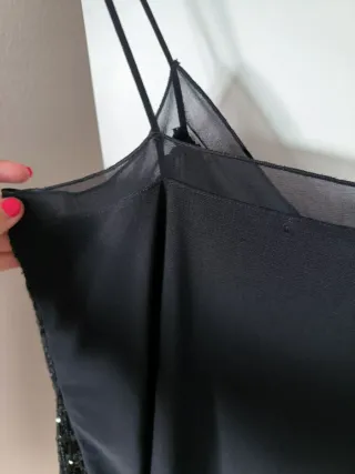 Top lentejuelas negro con tul