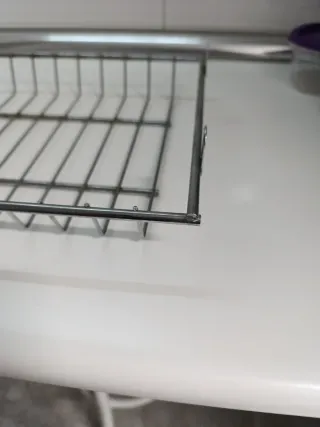 Escurrevasos. Rejilla superior del escurreplatos