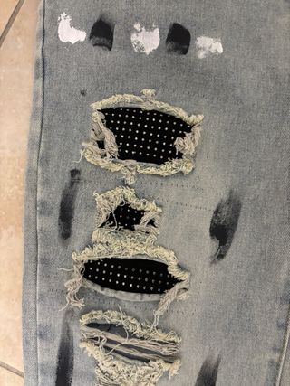 Jeans Amiri con strass e dettagli