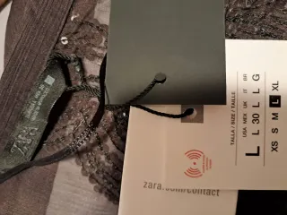 Blusa Zara lentejuelas y plumas