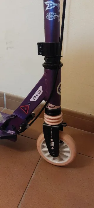 Patinete morado para niña