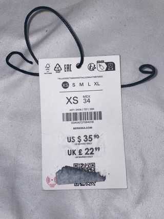 Pantalones vaqueros desgastados con cordón