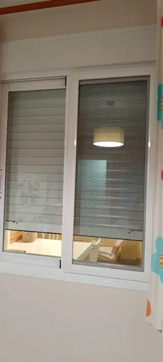 Mosquiteras para ventanas corredera. Torre atalaya