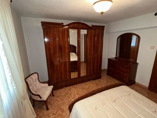 Dormitorio completo madera oscura