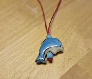 Set collana e bracciale con delfini