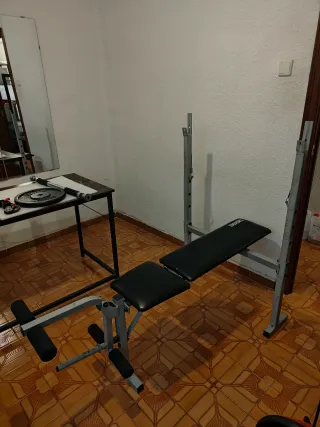 Banco de pesas y set de discos 129kg incluye barra