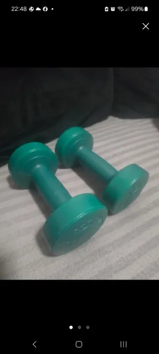 Pesas verdes para ejercicio