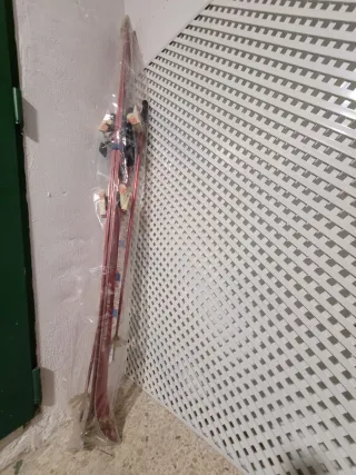 Esquís Rossignol 560 con bastones