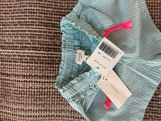 Shorts Nanos a righe verdi con laccetti