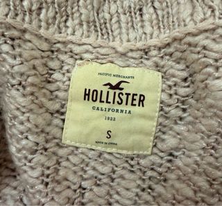 Jersey Hollister rosa cuello alto