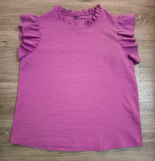 Blusa rosa con volantes