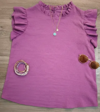 Blusa rosa con volantes