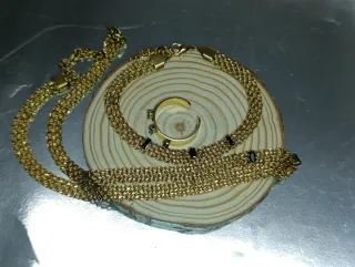 Conjunto de joyería de acero dorado