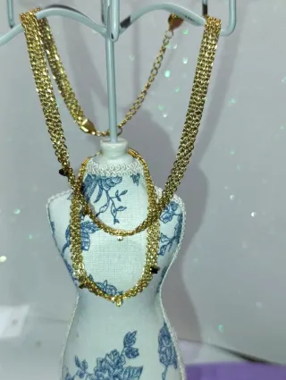 Conjunto de joyería de acero dorado