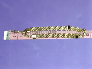 Conjunto de joyería de acero dorado