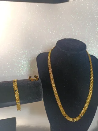 Conjunto de joyería de acero dorado