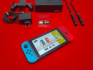 Nintendo Switch + Juegos