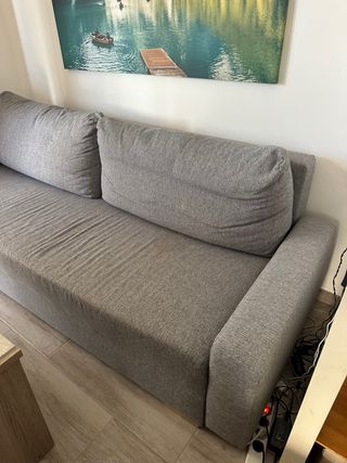 Sofá cama gris de tela