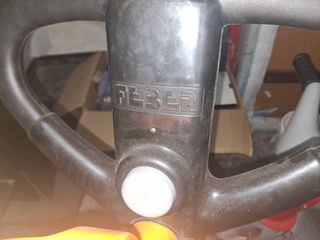 Triciclo Feber azul y naranja