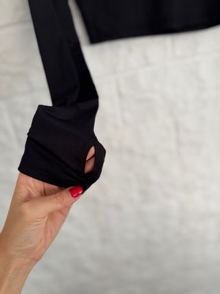 Top deportivo negro transpirable