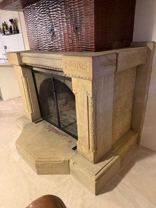 Chimenea de piedra natural y madera