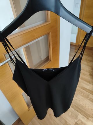 Falda lentejuelas y top negro