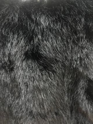 Chaleco corto pelo negro