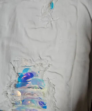 Pantalón vaquero blanco roto lentejuelas