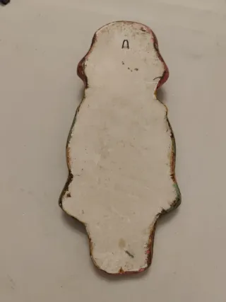 Muñeca artesanal niña con sombrero y flores