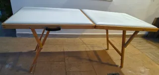 Camilla de masaje plegable.