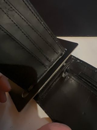 Billetera Quiksilver Negra. Defectuosa