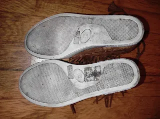 Botas de cuña marrones con flecos