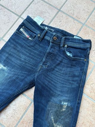 Jeans Diesel uomo blu strappati