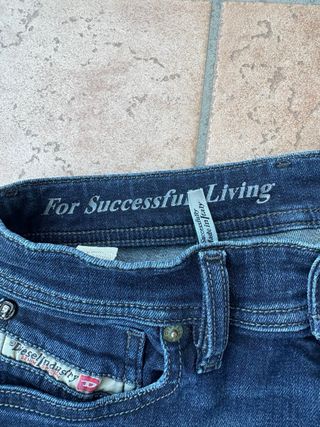 Jeans Diesel uomo blu strappati