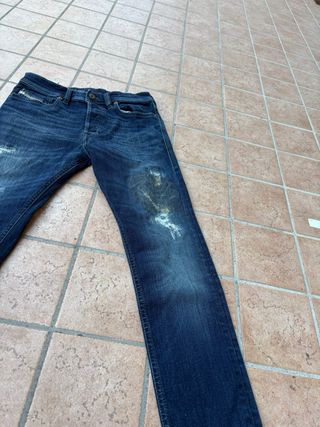 Jeans Diesel uomo blu strappati
