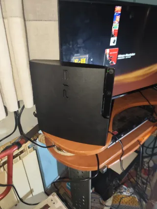 PS3 Slim 160GB Negra + Juegos