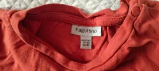 Maglietta neonato arancione con taschino