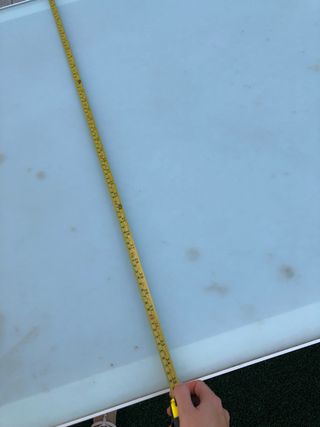 Mesa de comedor de cristal y metal