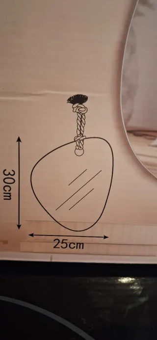 Espejo de pared con cuerda