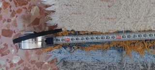 Alfombra de tela beige y azul