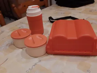 Portavivande arancione con manico e tracolla