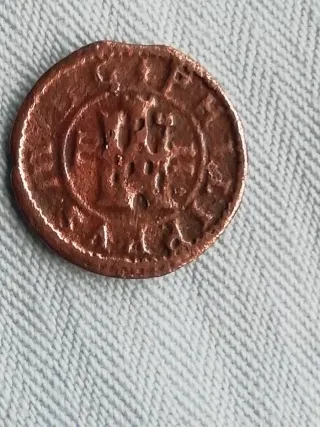 Moneda antigua de cobre