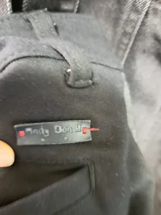 Pantaloni eleganti neri con banda laterale