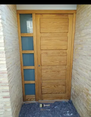 Puerta de madera o hierro a medida