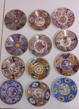 Juego de 12 tazas y platillos de porcelana