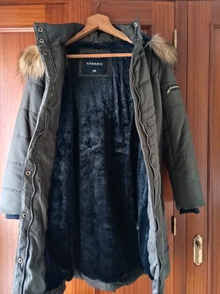 Parka verde forrada sin uso